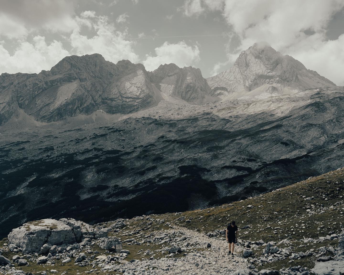 Lone figure on the ridge below the Zugspitze massif
